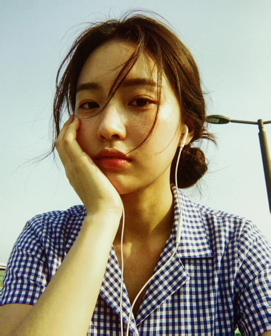 The same selfie through VX-3: warmer, with deeper shadows.
